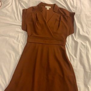 Short, stretchy brown dress. Never worn.